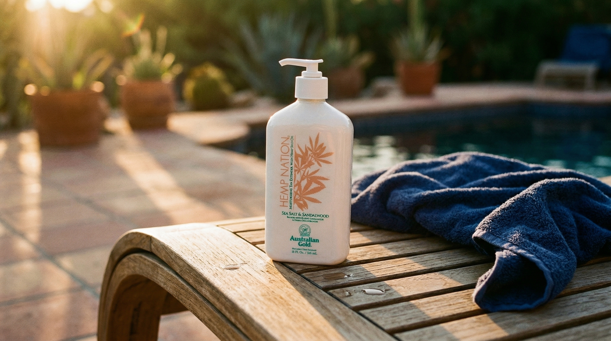 Hemp Nation tan extender bottle on wooden sun lounger in golden hour light